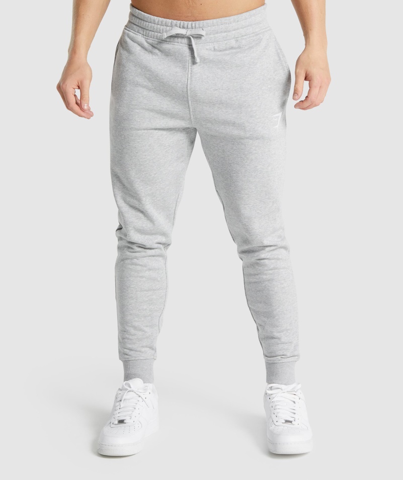 Gymshark Crest Joggers Svetlosivá Jadrová Marl