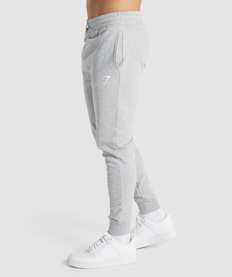 Gymshark Crest Joggers Svetlosivá Jadrová Marl