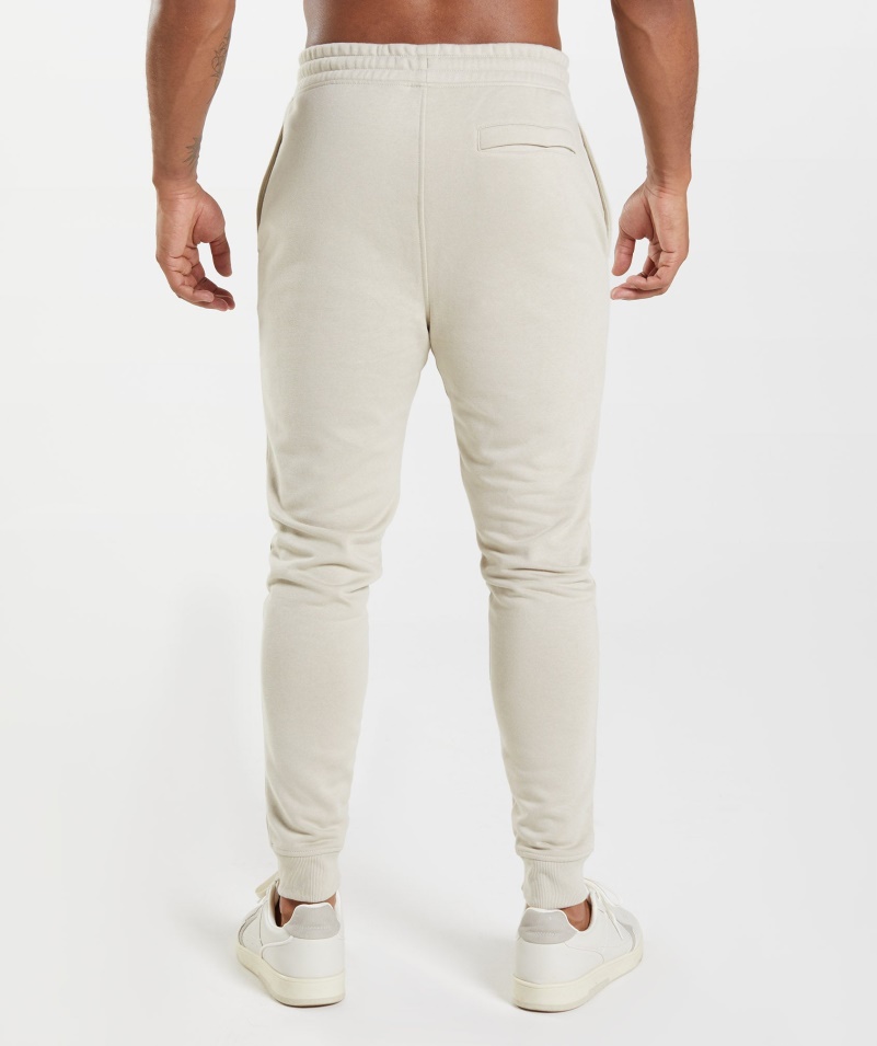Gymshark Crest Joggers Kamienková šedá
