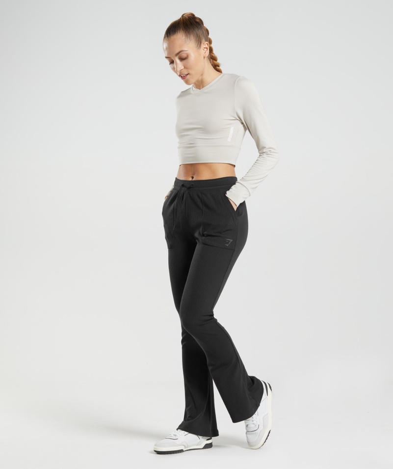 Gymshark Pauza Flared Nohavice čierne