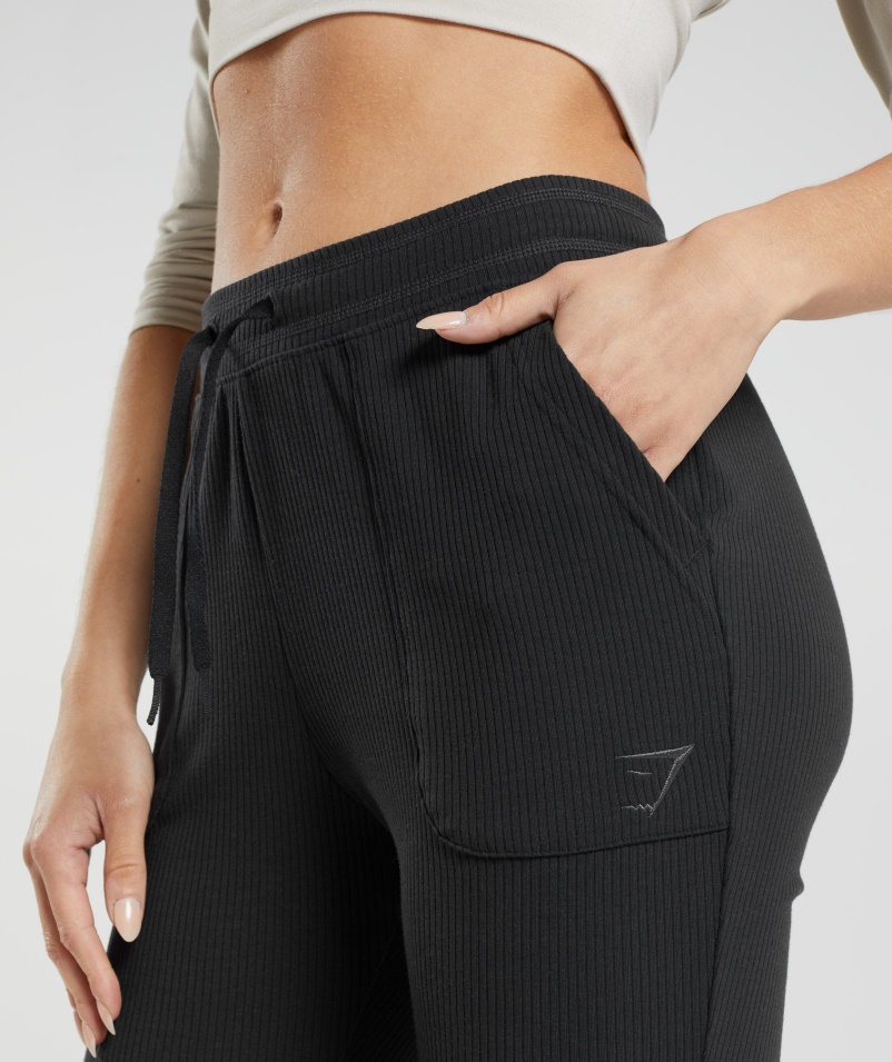 Gymshark Pauza Flared Nohavice čierne