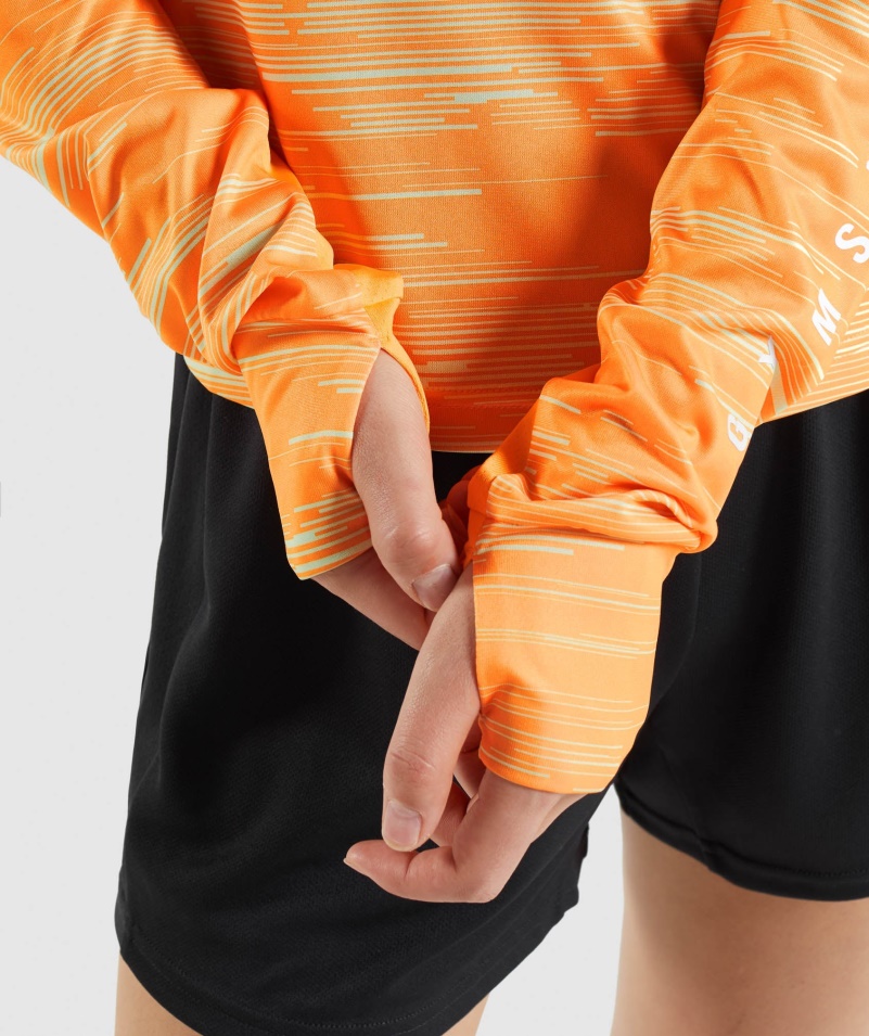 Gymshark športové Voľné Tričko S Dlhým Rukávom S Oranžovou Potlačou
