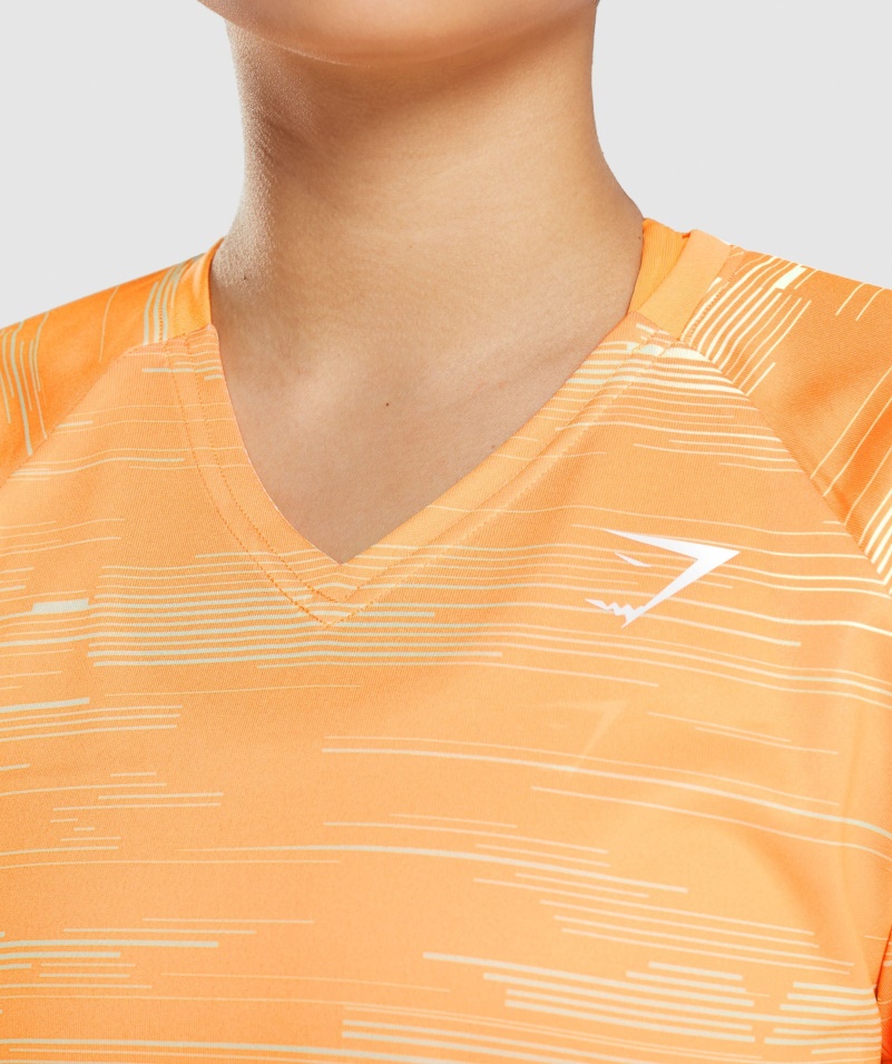 Gymshark športové Midi Tričko S Oranžovou Potlačou