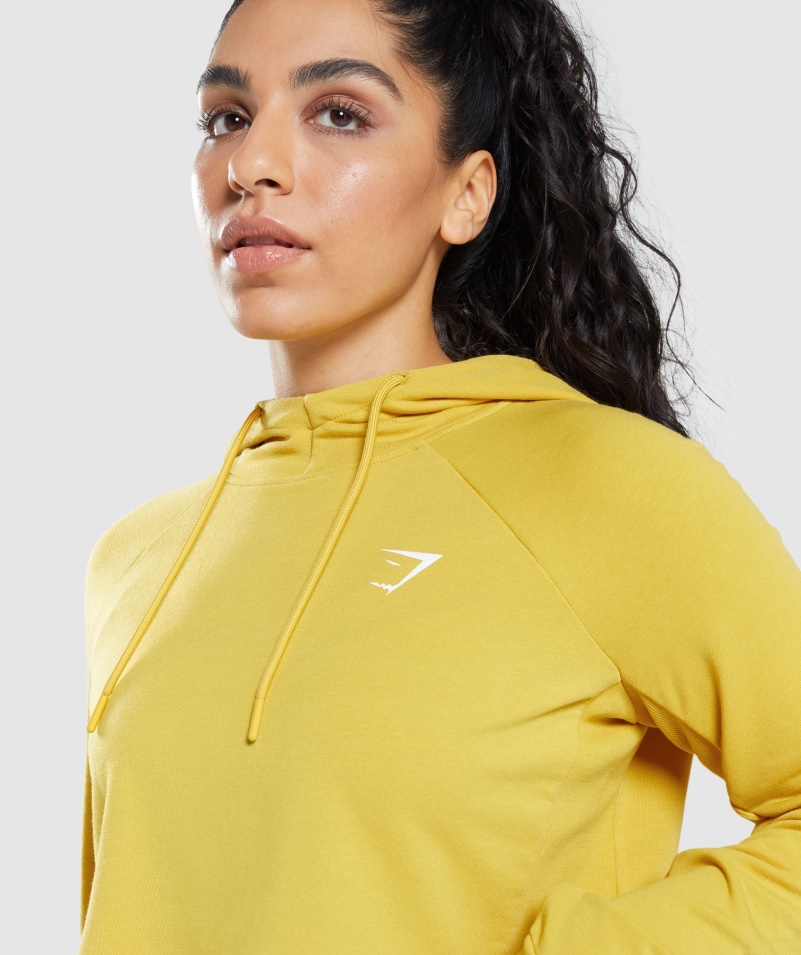Gymshark Training Cropped Mikina S Kapucňou Medailón žltý