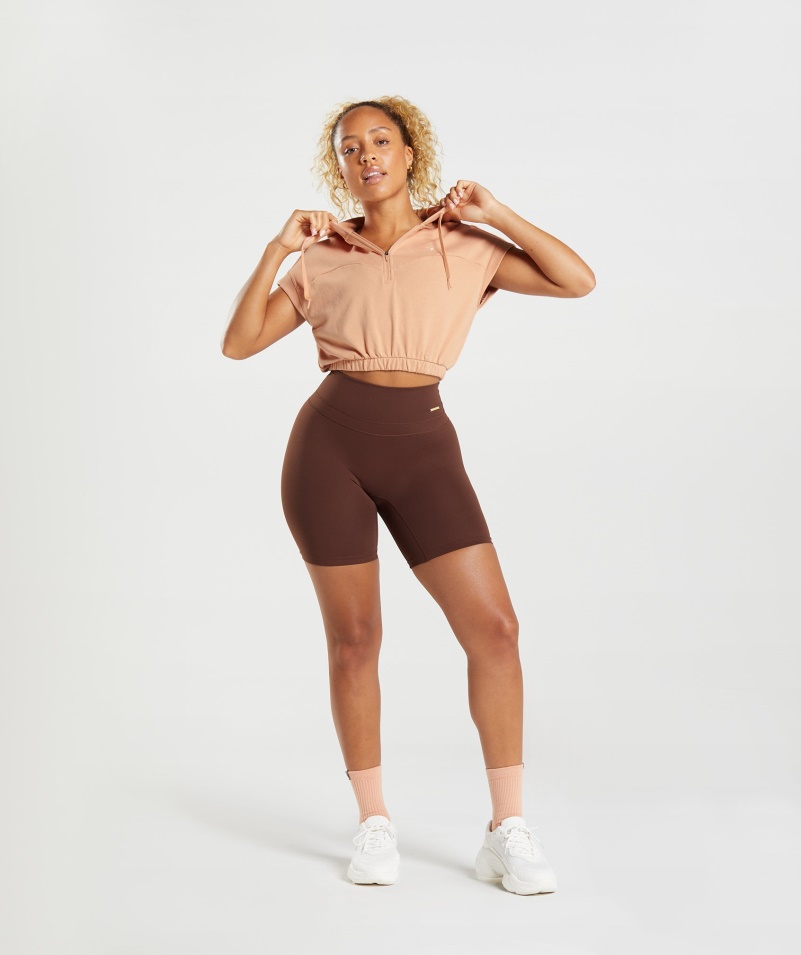 Gymshark Whitney Skrátená Mikina Bez Rukávov S Kapucňou Sunset Béžová