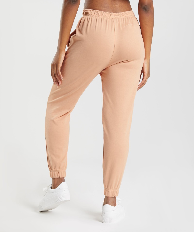Gymshark Whitney Voľné Joggers Západ Slnka Béžová